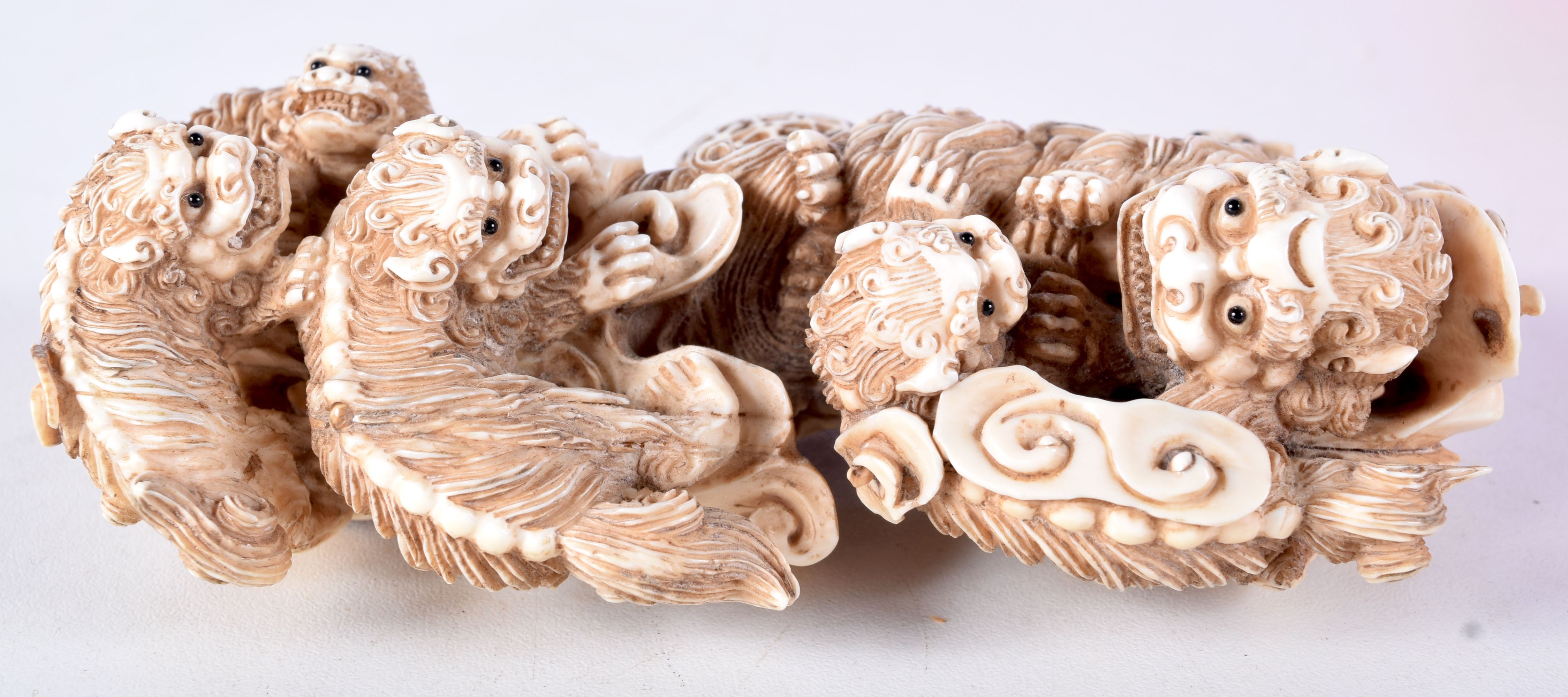 A FINE 19TH CENTURY JAPANESE MEIJI PERIOD CARVED IVORY OKIMONO modelled as numerous beasts in a play - Image 4 of 5