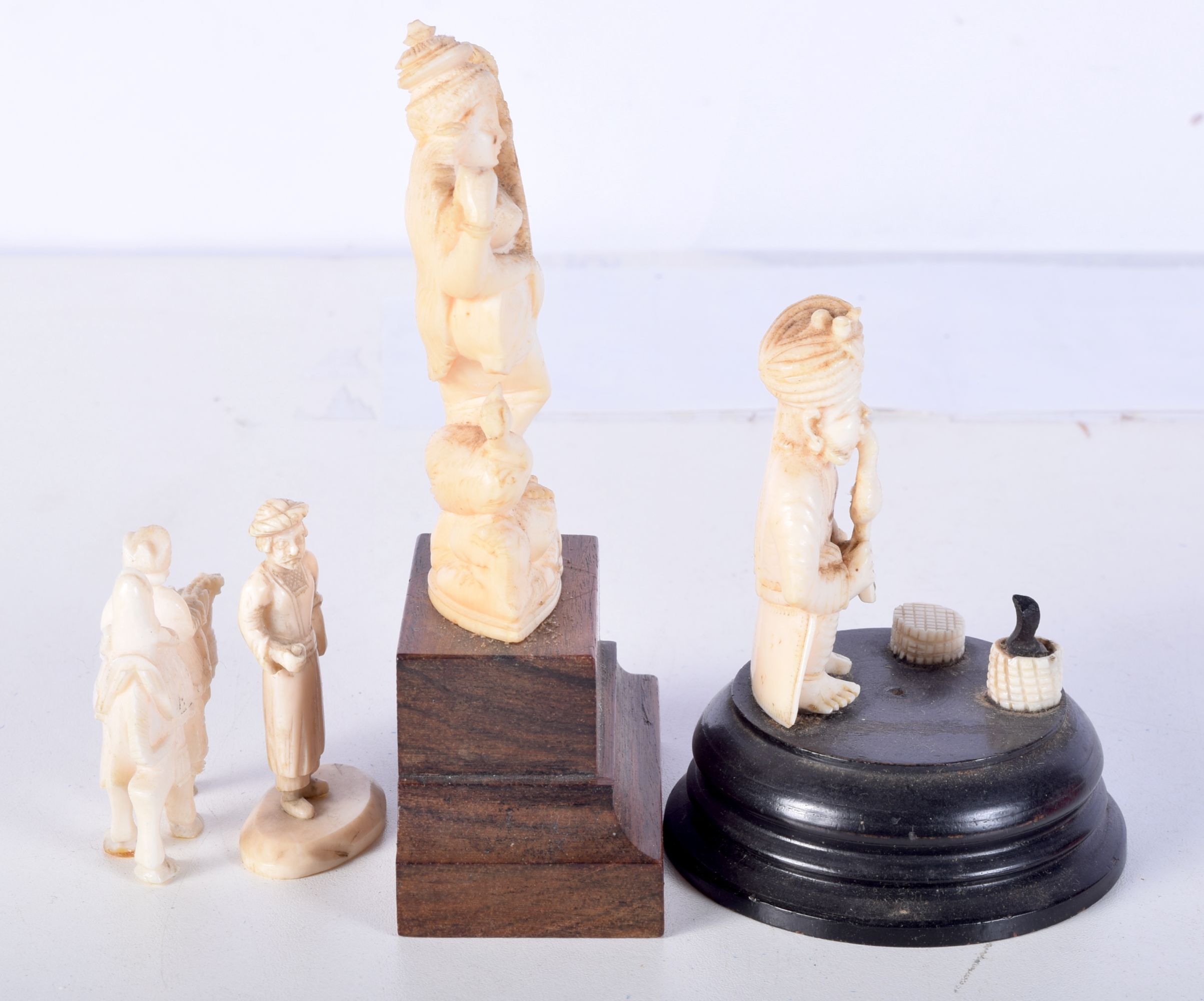 A 19TH CENTURY ANGLO INDIAN CARVED IVORY FIGURE OF A SNAKE CHARMER together with a musician and anot - Image 4 of 5