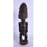 AN AFRICAN TRIBAL YORUBA MALE IBEJI FIGURE. 22 cm x 5 cm. Provenance: Ex Nettleship Collection.
