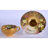 ROYAL WORCESTER MINIATURE TEACUP AND SAUCER PAINTED WITH PRIMROSES BY MISS TWINBORROW, SAUCER SIGNED