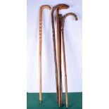 A collection of wooden walking canes longest 92cm (5).