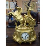 A LARGE LATE 19TH CENTURY FRENCH GILT BRONZE CLOCK formed with rearing horses. 57 cm x 28 cm.