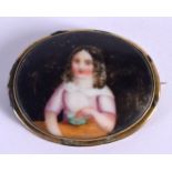 AN ANTIQUE PORCELAIN BROOCH. 18 grams. 5.5 cm x 4.5 cm.