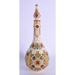 AN AESTHETIC MOVEMENT RETICULATED ISLAMIC MARKET VASE AND COVER painted with jewelled motifs. 24 cm