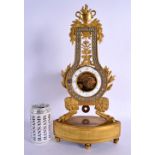 AN EARLY 19TH CENTURY FRENCH EMPIRE GILT BRONZE CLOCK set with diamonte, upon unusual hoof feet. 42