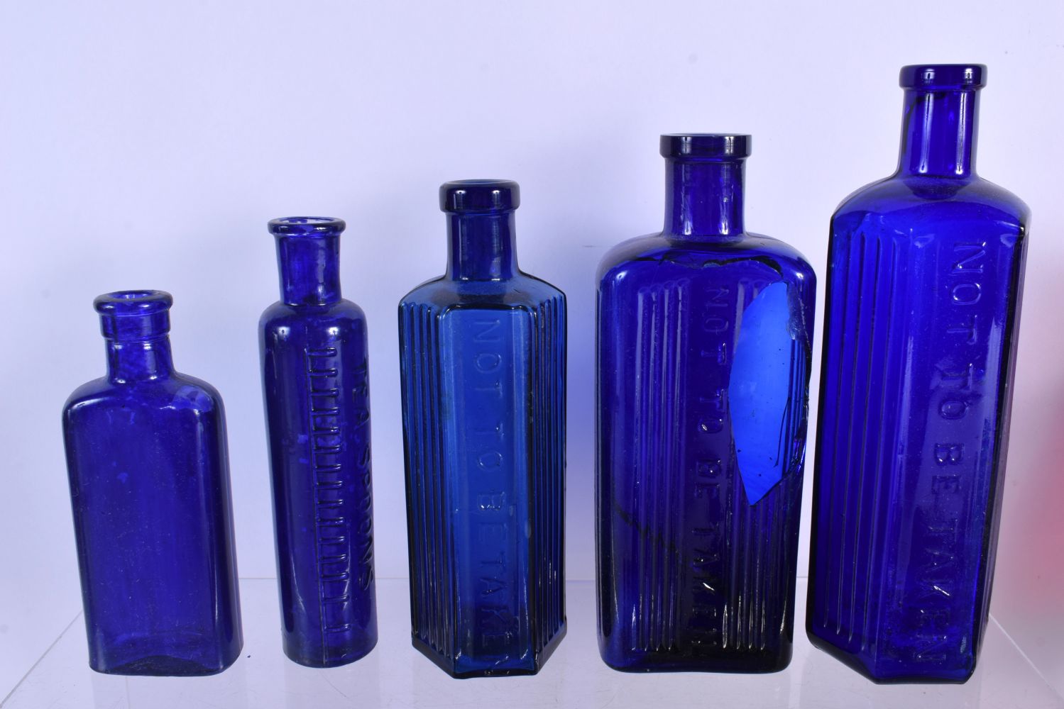 A COLLECTION OF VINTAGE GLASS POISON BOTTLES in various forms and sizes. (qty) - Image 2 of 11