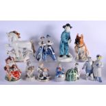 A COLLECTION OF RUSSIAN & USSR PORCELAIN FIGURES in various forms and sizes. Largest 31 cm high. (qt