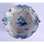 A 19TH CENTURY ITALIAN CANTAGALLI TIN GLAZED POTTERY DISH painted with landscapes. 21 cm wide.