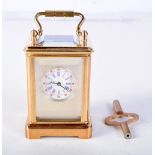 MINIATURE CARRIAGE CLOCK WITH KEY. 6.4cm x 4.1cm x 3.6cm, weight 235g