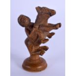 A RARE 18TH/19TH CENTURY CHINESE CARVED BAMBOO CHESS PIECE formed as a male wearing a horse. 8 cm x