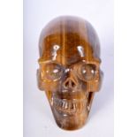 A TIGERS EYE SKULL. 8cm x 4.5cm x 6cm