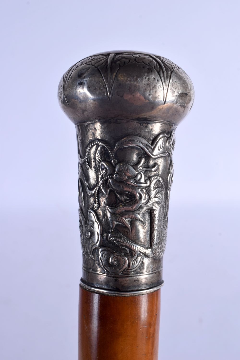 A 19TH CENTURY CHINESE EXPORT SILVER TOPPED MALACA WALKING CANE decorated with dragons. 90 cm long.