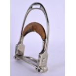 A SNICKLE PARKER AND SONS OF LONDON PATENTED STIRRUP. 16 cm x 10 cm.