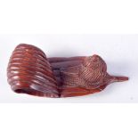 A JAPANESE WOOD CARVING OF A SNAIL ON A LEAF. 11cm x 4cm x 4cm, weight 41g