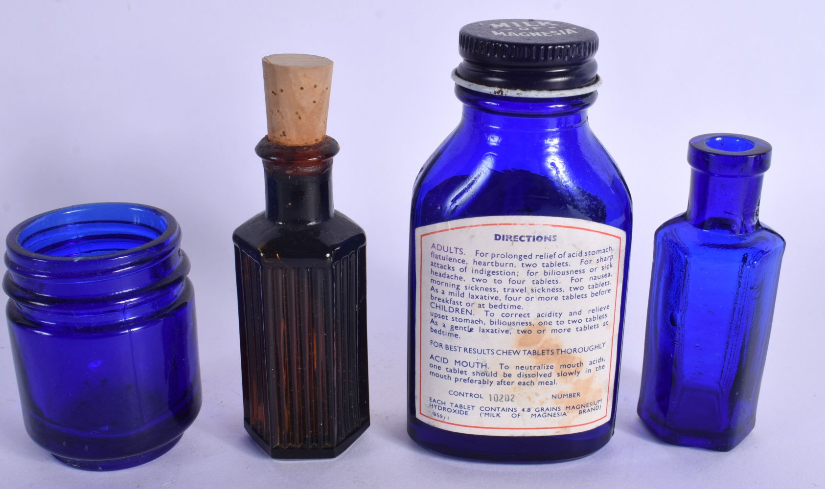 A COLLECTION OF VINTAGE GLASS POISON BOTTLES in various forms and sizes. (qty) - Image 11 of 11
