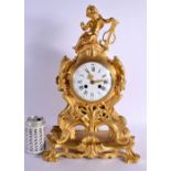 A LARGE MID 19TH CENTURY FRENCH ORMOLU MANTEL CLOCK formed with a cherub upon a rococo base. 48 cm x