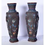 A pair of Cloisonne enamel vases decorated with birds and foliage. 30cm.