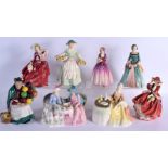 EIGHT ROYAL DOULTON PORCELAIN FIGURES modelled in various forms. Largest 18 cm x 12 cm. (8)