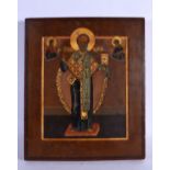 AN ANTIQUE PAINTED RUSSIAN WOOD ICON. 30 cm x 26 cm.