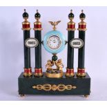 A FINE CONTINENTAL SILVER ENAMEL AND DIAMOND CLOCK formed with lions holding aloft a circular dial.