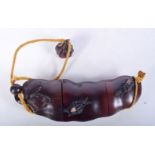 A JAPANESE HARDWOOD INRO CARVED AS A FRUIT. 17cm X 5cm