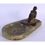 AN ANTIQUE AUSTRIAN COLD PAINTED BRONZE ARABIC MALE upon an ashtray. 18 cm x 10 cm.