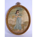 AN EARLY 19TH CENTURY ENGLISH FRAMED SILK STUMP WORK TYPE PAMEL depicting a female. 35 cm x 24 cm.