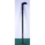 A carved Ebony walking cane with an elephant head handle .90cm.