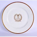 A FRENCH LOUIS PHILIPPE SEVRES PORCELAIN PLATE with gilt monogram. 22 cm diameter.