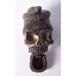 A BRASS VESTA CASE IN THE FORM OF A SKULL WITH A SNAKE WRAPPED AROUND THE TOP. 5.1cm x 3.7cm, weig