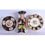 A LARGE 19TH CENTURY ENGLISH POTTERY TOBY JUG together with two English plates. Largest 31 cm high.