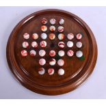 A SET OF SOLIATAIRE MARBLES. 20 cm diameter. (qty)