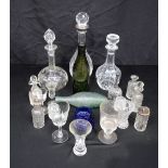 A collection of cut/lead glass decanters together with a collection of glasses, condiments, antique