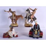 TWO REG JOHNSON POTTERY FIGURES OF ARABIANS together with a pair of European figures of Wild West in