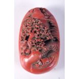 A CHINESE PEBBLE CARVED WITH A LANDSCAPE SCENE. 9cm x 5.4cm x 3.4cm, weight 205g