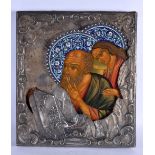 A RARE ANTIQUE SILVER AND ENAMEL MOUNTED PAINTED RUSSIAN WOOD ICON. 46 cm x 36 cm.