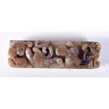 A CHINESE JADE BELT LOOP CARVED WITH FRUITING PODS. 10.4cm x 3.1cm x 2.6cm, weight 118.6g