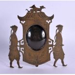AN UNUSUAL ANTIQUE CHINESE BRASS FRAME. 14 cm x 11 cm.