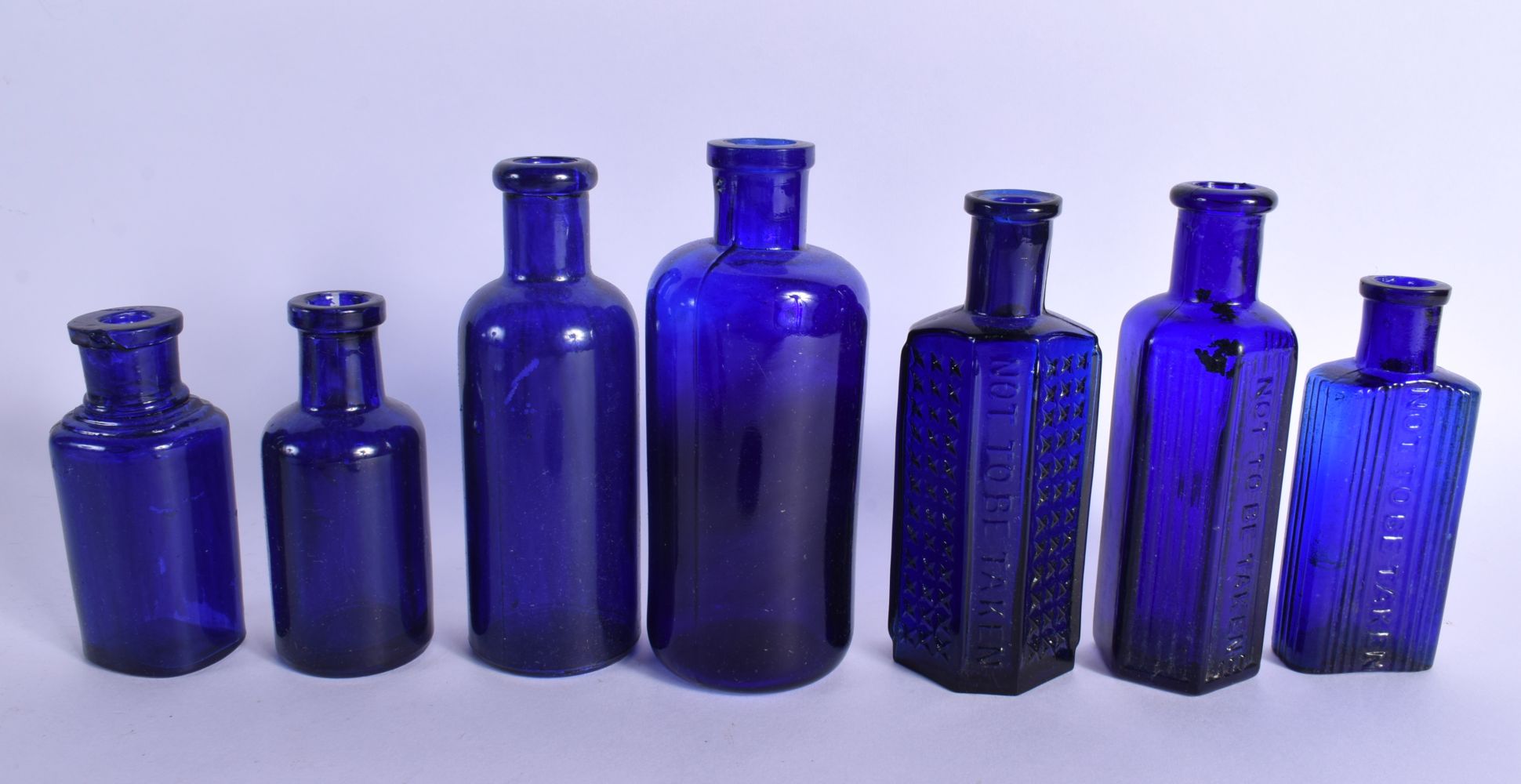 A COLLECTION OF VINTAGE GLASS POISON BOTTLES in various forms and sizes. (qty) - Image 8 of 11