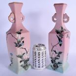 A VERY RARE PAIR OF EARLY 20TH CENTURY JAPANESE MEIJI PERIOD VASES painted with birds on an imitatio