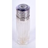 A VINTAGE SILVER TOPPED SCENT BOTTLE. 7.6cm x 2.3cm, weight 38.3g