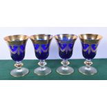 A collection of vintage wine glasses decorated with gilt. (4).