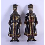 A CONTEMPORARY CONTINENTAL COLD PAINTED BRONZE COSSACKS. 17 cm high.
