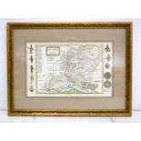 A framed map of Hampshire by Herman Moll dated 1724. 20 x 32 cm