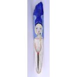 AN UNUSUAL FOLK ART AND PAINTED DRIFT WOOD PANEL depicting a female. 78 cm long.