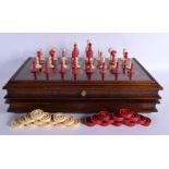 AN ANTIQUE EUROPEAN BONE CHESS SET with large mixed wood chess set. (qty)