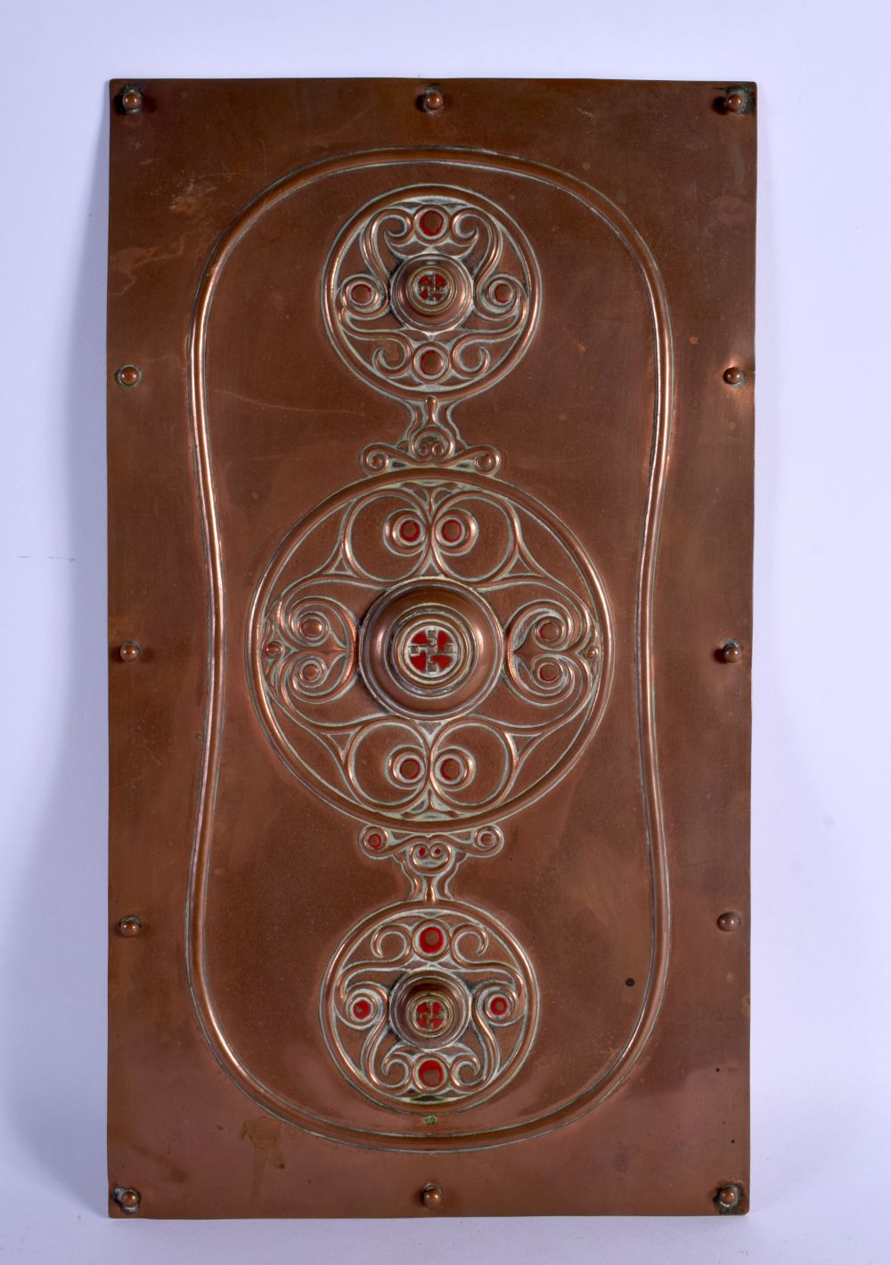 AN ARTS AND CRAFTS COPPER AND ENAMEL HANGING WALL PLAQUE signed AGF, decorated with roundels. 37 cm