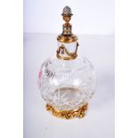 A CONTINENTAL SILVER MOUNTED SCENT BOTTLE, THE TOP ENCRUSTED WITH DIAMONDS. 15.5cm x 8.8cm, weight