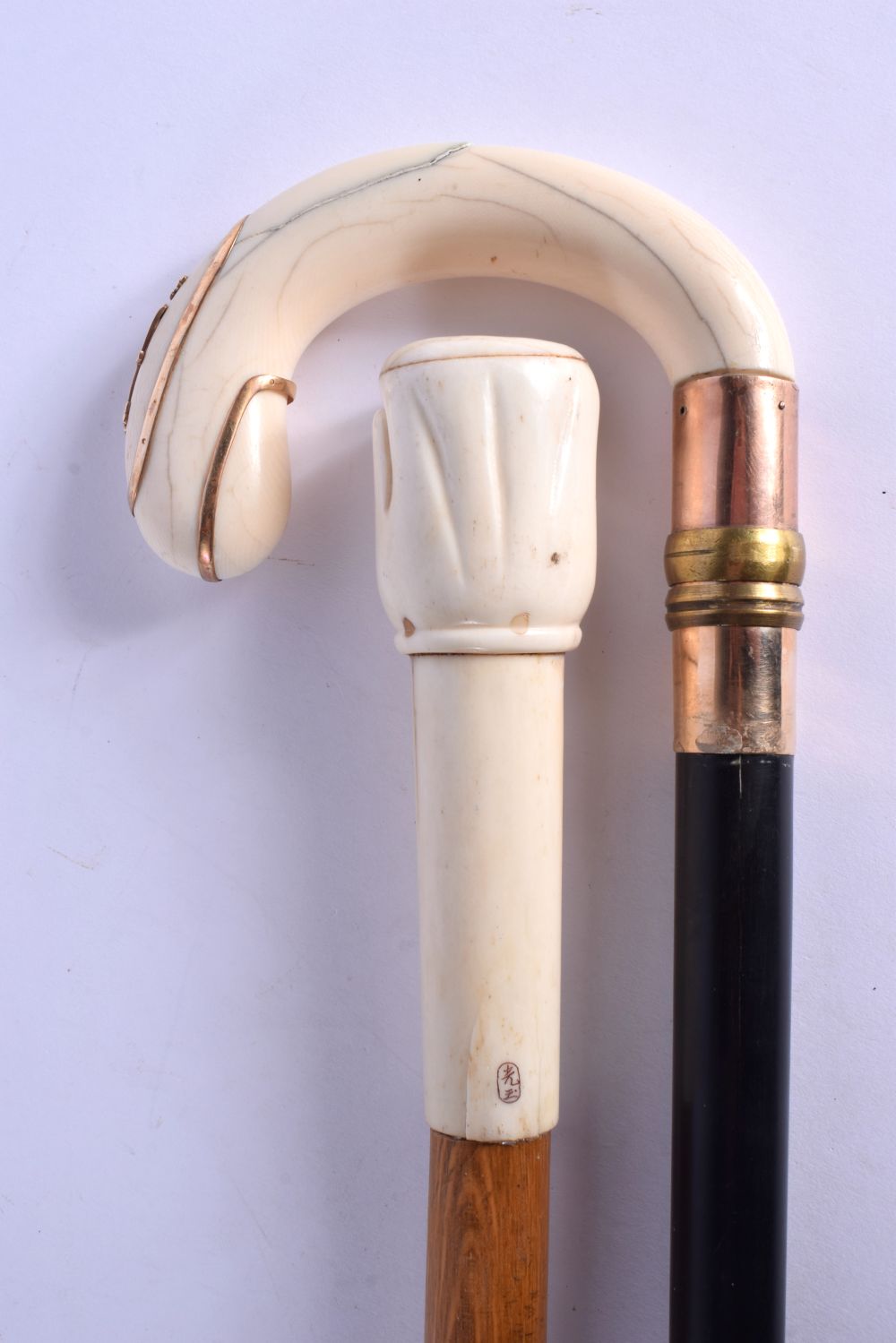 A VICTORIAN GOLD OVERLAID IVORY WALKING CANE together with a carved bone handled cane. Largest 84 cm - Image 2 of 5