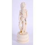 A RARE 19TH CENTURY EUROPEAN IVORY FIGURE OF A STANDING MALE modelled shirtless and roaming. 12 cm h